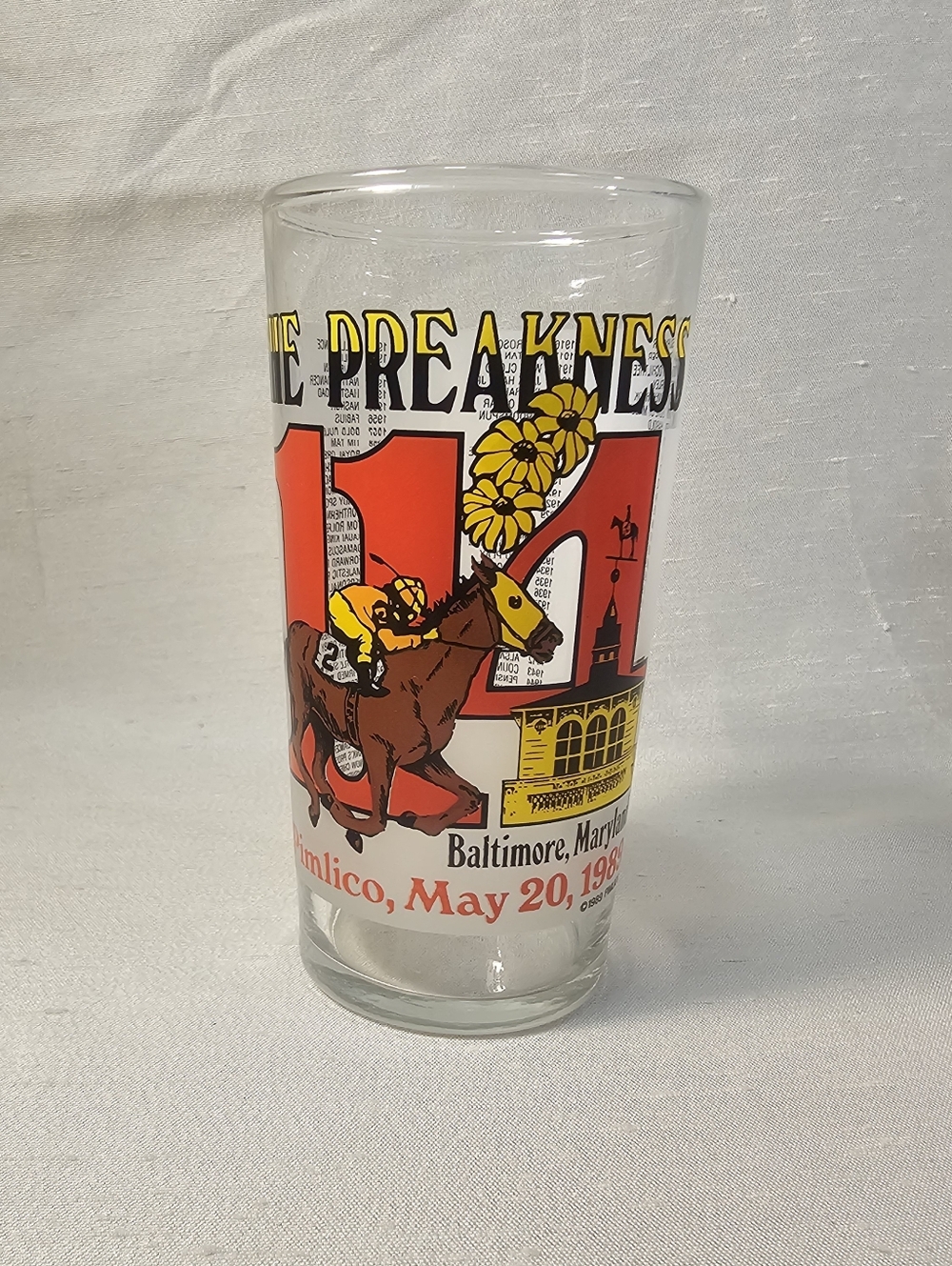 114th Preakness Commemorative Racing Glass - Red, Yellow, Brown Design